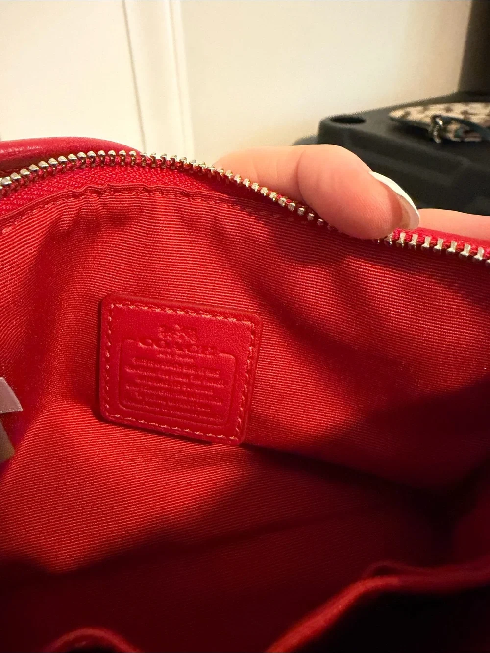 Coach two wristlets